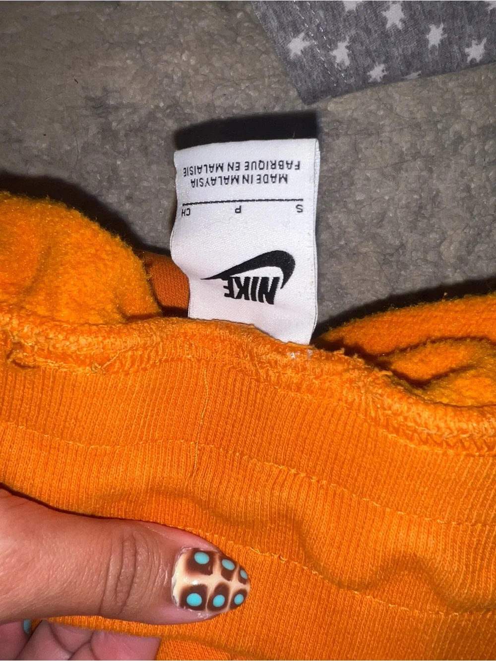 Nike Women’s Pheonix Orange Joggers with White Swoosh